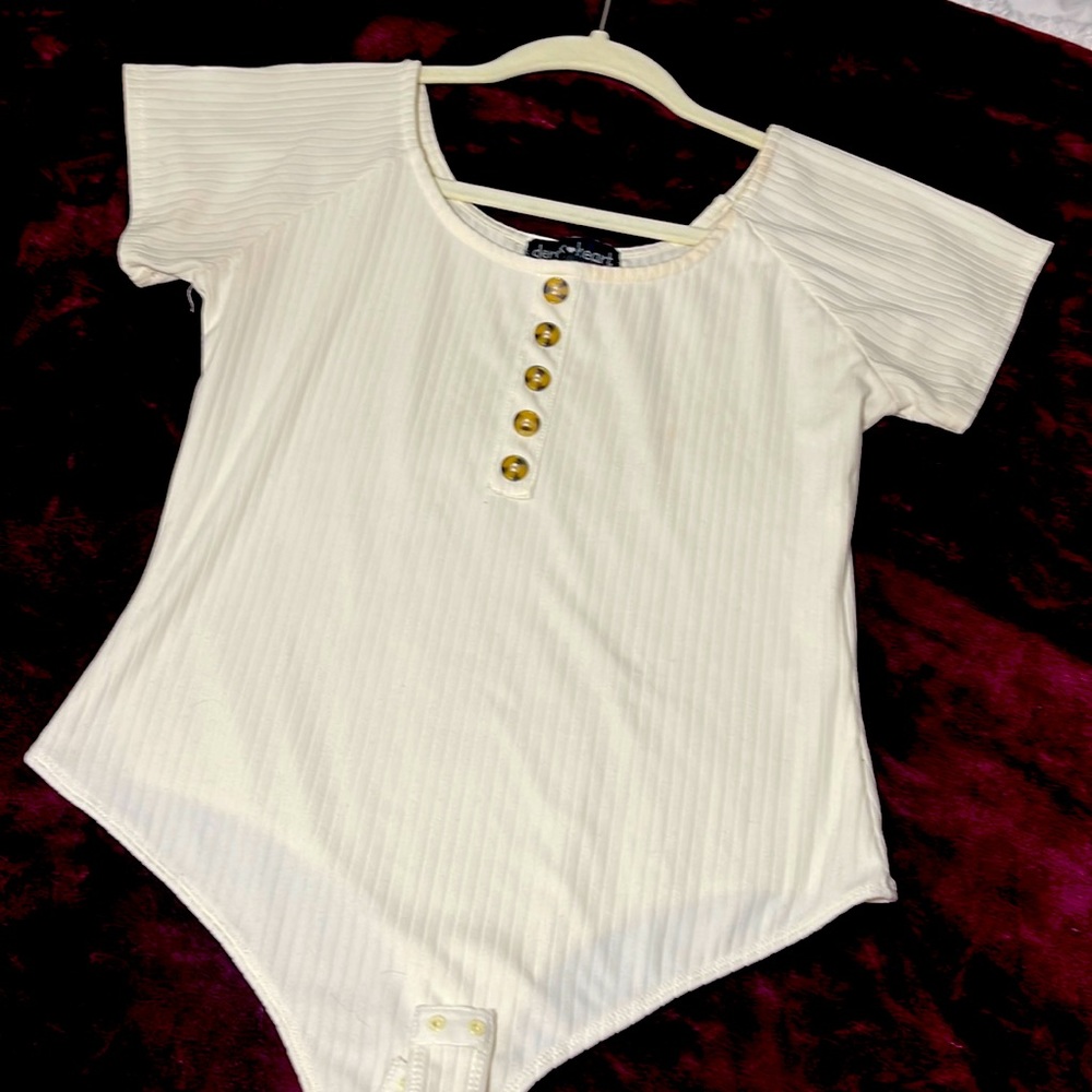 short sleeved white body suit, size Large. Like new!